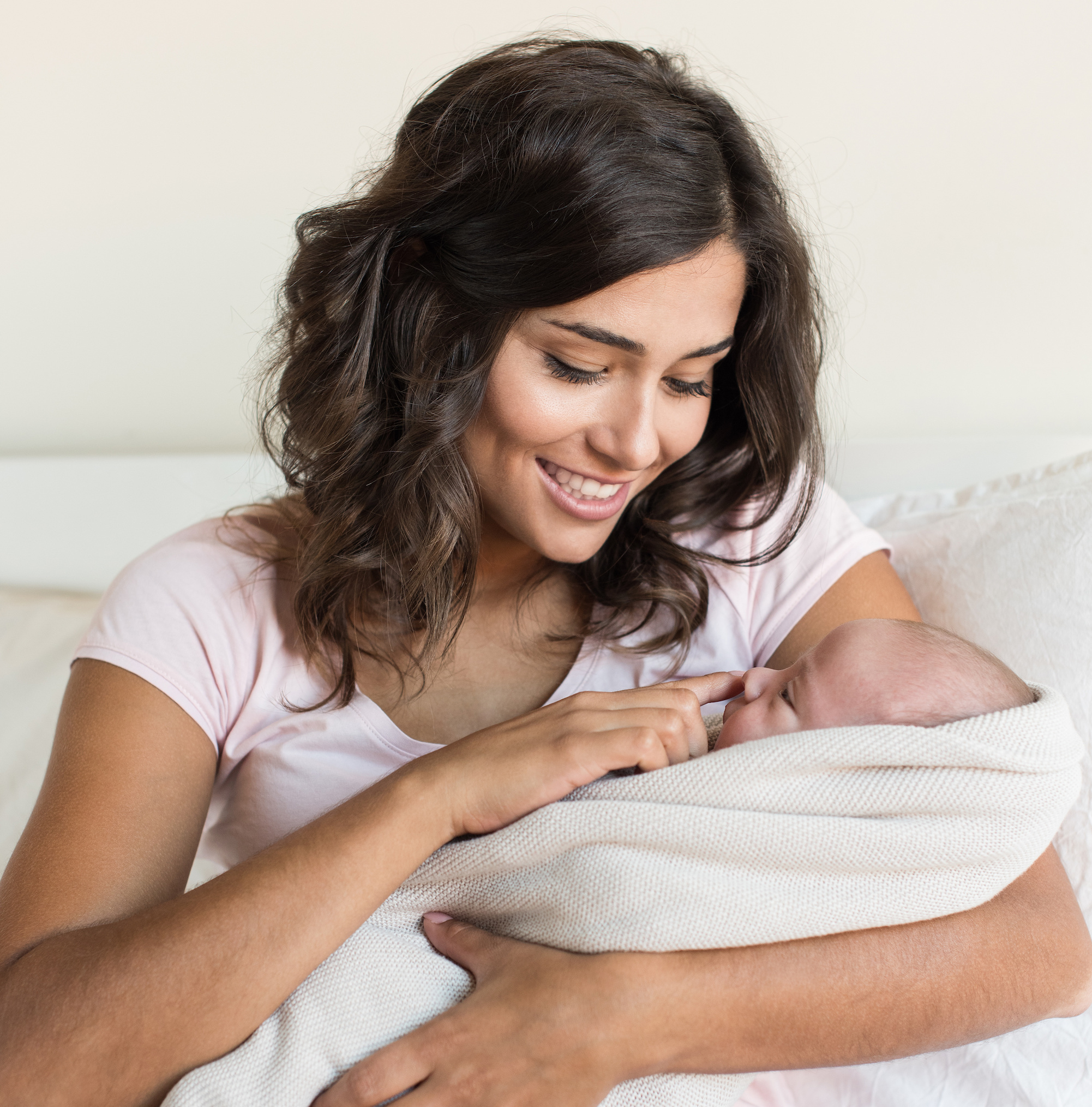 Mother holding newborn baby